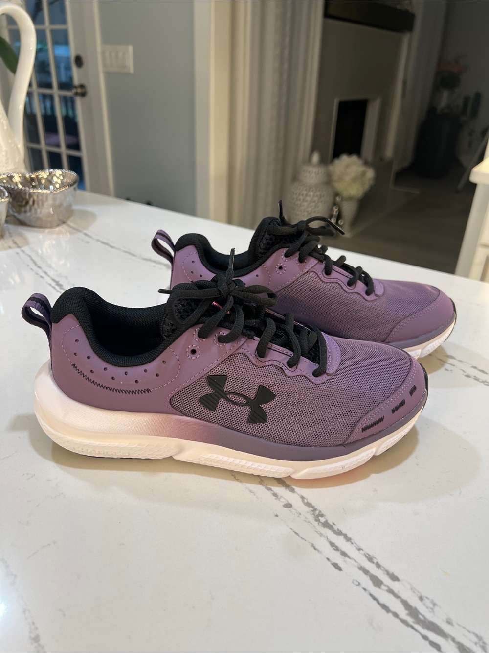 Under Armour in Purple/Black  Athletic Sneakers Charged Assert 10 Women’s size 7